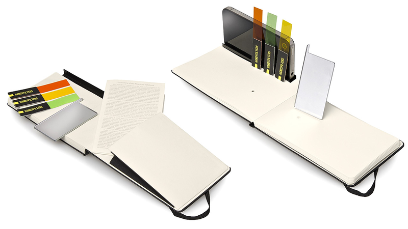Illustration for article titled A Tiny iPhone Photography Studio Built Into a Moleskine Notebook